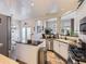 Modern kitchen featuring an island, stainless steel appliances, and a breakfast nook at 2676 S Troy Ct, Aurora, CO 80014