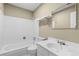 A clean, well-lit bathroom includes a tub, shower, and vanity with modern fixtures at 3720 S Fairplay Way, Aurora, CO 80014