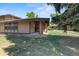 Inviting single-story house with well-maintained lawn and mature trees at 3720 S Fairplay Way, Aurora, CO 80014