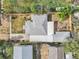 Overhead view of the property, displaying the roof, driveway, yard and the backyard patio at 7760 Magnolia St, Commerce City, CO 80022