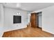 Empty bedroom with hardwood floors and a closet; freshly painted and ready to occupy at 7760 Magnolia St, Commerce City, CO 80022