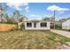 Charming single-story home with a well-maintained front yard and a covered parking area at 7760 Magnolia St, Commerce City, CO 80022