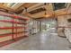 Large garage interior with shelving units at 7760 Magnolia St, Commerce City, CO 80022