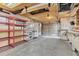 Garage featuring shelves and work area at 7760 Magnolia St, Commerce City, CO 80022