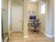Home office featuring neutral colors, and a built-in desk, offering a bright and organized workspace at 11932 W Long Cir # 202, Littleton, CO 80127