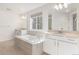 Elegant bathroom with soaking tub and double vanity at 3589 Rucksack Ct, Castle Rock, CO 80108