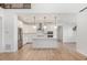 Modern kitchen with white cabinets and stainless steel appliances at 3589 Rucksack Ct, Castle Rock, CO 80108