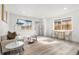 Inviting living room with modern furniture, stylish decor, and natural light from windows at 3311 Jasmine St, Denver, CO 80207