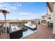 Beautiful rooftop deck with an outdoor fireplace, comfortable seating, and stunning views at 10468 Ladera Dr, Lone Tree, CO 80124