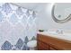 Bathroom with a vanity, sink, toilet, and a shower with a decorative curtain at 1081 E 119Th Pl, Northglenn, CO 80233