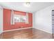 Bright bedroom with hardwood floors, large window, and neutral walls at 1081 E 119Th Pl, Northglenn, CO 80233