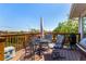 Outdoor deck with a seating area, perfect for enjoying a meal al fresco at 1081 E 119Th Pl, Northglenn, CO 80233