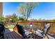 Outdoor deck with a seating area, perfect for enjoying a meal al fresco at 1081 E 119Th Pl, Northglenn, CO 80233