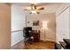 Loft office space with hardwood floors, ceiling fan, and a bright light at 546 Lost Valley Pt, Castle Rock, CO 80108