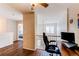 Upper-level home office space with hardwood floors and modern furnishings at 546 Lost Valley Pt, Castle Rock, CO 80108