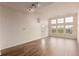 Spacious living room features hardwood floors, light walls, and lots of natural light at 9633 E 5Th Ave # 10304, Denver, CO 80230
