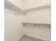 A walk-in closet with shelving and carpeted floor at 9633 E 5Th Ave # 10304, Denver, CO 80230