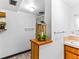 Bright bathroom featuring a tiled shower, decorative shelving, and a modern vanity at 1050 Youngfield St, Golden, CO 80401