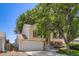Charming two-story home with red shutters, attached garage and mature landscaping at 11200 W 102Nd Ave, Broomfield, CO 80021