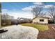 Backyard featuring a patio, grass, garden beds, string lights and fenced in yard at 2039 S Sherman St, Denver, CO 80210