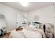 Cozy bedroom featuring neutral tones, decorative wall art, and a comfortable bed at 2039 S Sherman St, Denver, CO 80210