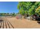 Animal enclosure with red bench and chicken coop at 9852 Zephyr Dr, Broomfield, CO 80021