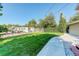 Well-maintained backyard featuring a lush lawn and ample space at 9852 Zephyr Dr, Broomfield, CO 80021