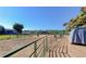 Pasture with green fencing, a small shelter and a horse at 9852 Zephyr Dr, Broomfield, CO 80021