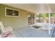 Covered patio with concrete flooring and seating area at 9852 Zephyr Dr, Broomfield, CO 80021