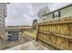 Fenced backyard with an air conditioner and a view of the surrounding area at 9023 Apache Plume Dr # D, Parker, CO 80134