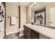 Bathroom with shower featuring eye-catching curtain, cabinet, and large countertop at 9023 Apache Plume Dr # D, Parker, CO 80134