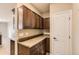 Pantry with plenty of cabinet space, a countertop, and convenient access at 9023 Apache Plume Dr # D, Parker, CO 80134
