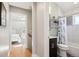 Upstairs bathroom with a modern sink and a shower-tub combination at 3207 N Marion St, Denver, CO 80205
