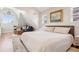 Bright bedroom with a comfortable bed, sitting area, unique architecture, and tasteful decor at 3207 N Marion St, Denver, CO 80205