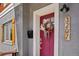 Close-up of the home's entry, highlighted by a colorful door and stylish exterior details at 3207 N Marion St, Denver, CO 80205