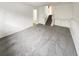 Finished basement with neutral carpet and access to the upper floors at 16841 E Mansfield Cir, Aurora, CO 80013