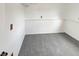 Storage room in finished basement with neutral carpet and white walls at 16841 E Mansfield Cir, Aurora, CO 80013