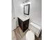 Bathroom featuring a modern vanity with a marble countertop and stylish fixtures at 16841 E Mansfield Cir, Aurora, CO 80013