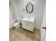 Clean bathroom with a vanity, tile floor, toilet, and a shower-tub combination at 16841 E Mansfield Cir, Aurora, CO 80013