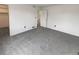 Spacious bedroom with neutral carpeting and a closet with ample storage space at 16841 E Mansfield Cir, Aurora, CO 80013