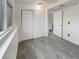 Bright bedroom features plush carpeting, closet, and neutral paint at 16841 E Mansfield Cir, Aurora, CO 80013