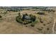 Aerial view of the property, showing the house and its secluded, wooded surroundings at 8853 N Awl Rd, Parker, CO 80138