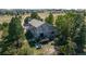 Aerial view of the property, showing the back of the house with its deck and barbecue at 8853 N Awl Rd, Parker, CO 80138