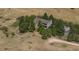 Aerial shot showcasing the house, the storage shed, and outdoor amenities at 8853 N Awl Rd, Parker, CO 80138