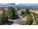 Aerial view of a spacious home with a well-manicured lot at 8853 N Awl Rd, Parker, CO 80138