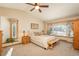 Cozy bedroom with vaulted ceilings, natural light, and views of the outdoors at 8853 N Awl Rd, Parker, CO 80138