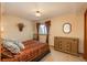 Bedroom featuring a decorative headboard and natural light at 8853 N Awl Rd, Parker, CO 80138