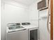 A practical laundry room features modern washer and dryer units at 8853 N Awl Rd, Parker, CO 80138