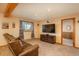 Finished basement offering a cozy seating area and entertainment space at 8853 N Awl Rd, Parker, CO 80138