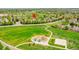 Neighborhood aerial view showcasing community playground and nearby park, perfect for outdoor activities at 10653 W Parkhill Dr, Littleton, CO 80127